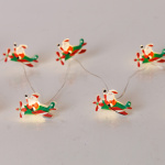 ΣΕΙΡΑ, 20 MINI LED, ΑΓΙΟΣ ΒΑΣΙΛΗΣ ΜΕ ΑΕΡΟΠΛΑΝΟ, ΜΠΑΤΑΡΙΑΣ 3xAA, ΧΡΟΝΟΔΙΑΚΟΠΤΗ, ΑΣΗΜΙ ΧΑΛΚΙΝΟ ΚΑΛΩΔΙΟ, ΘΕΡΜΟ ΛΕΥΚΟ LED ΑΝΑ 10cm, ΠΡΟΕΚΤΑΣΗ ΠΑΡΟΧΗΣ 30cm, IP20 - Image 2