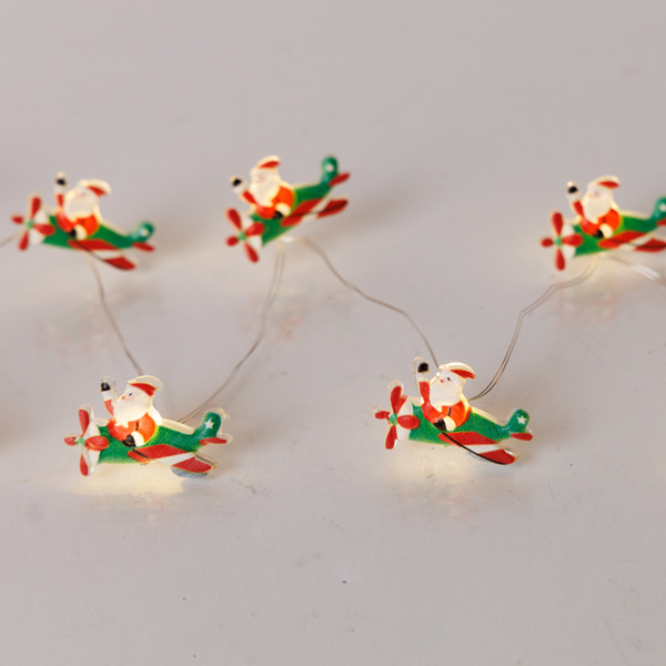 ΣΕΙΡΑ, 20 MINI LED, ΑΓΙΟΣ ΒΑΣΙΛΗΣ ΜΕ ΑΕΡΟΠΛΑΝΟ, ΜΠΑΤΑΡΙΑΣ 3xAA, ΧΡΟΝΟΔΙΑΚΟΠΤΗ, ΑΣΗΜΙ ΧΑΛΚΙΝΟ ΚΑΛΩΔΙΟ, ΘΕΡΜΟ ΛΕΥΚΟ LED ΑΝΑ 10cm, ΠΡΟΕΚΤΑΣΗ ΠΑΡΟΧΗΣ 30cm, IP20 - Image 2