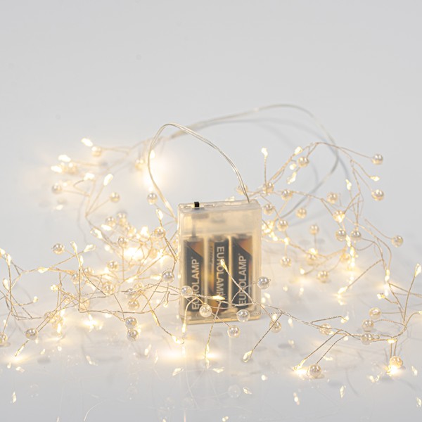 90f39bd436944268814a4e035d0f536a CLUSTER 2m, 120 MINI LED, ΠΕΡΛΕΣ, ΜΠΑΤΑΡΙΑΣ 3xAA, ΑΣΗΜΙ ΧΑΛΚΙΝΟ ΚΑΛΩΔΙΟ, ΘΕΡΜΟ ΛΕΥΚΟ LED, ΠΡΟΕΚΤΑΣΗ ΠΑΡΟΧΗΣ 50cm, IP20 - Image 1